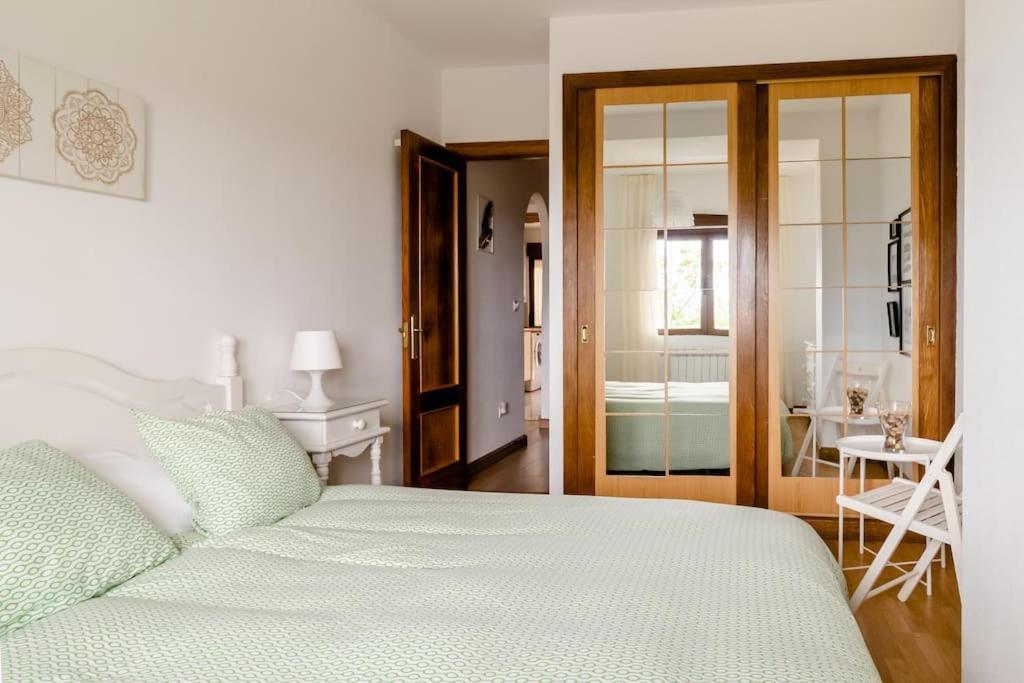 Casa De Las Flores - Apartamento Con Jardin Privado Frente A La Playa De Comillas Eksteriør billede