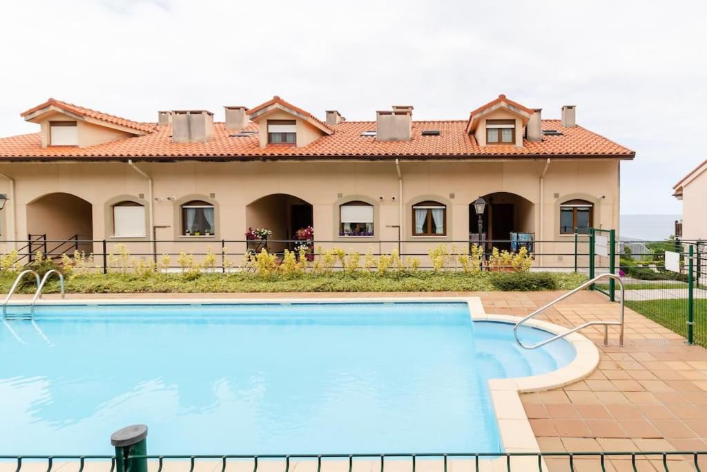 Casa De Las Flores - Apartamento Con Jardin Privado Frente A La Playa De Comillas Eksteriør billede